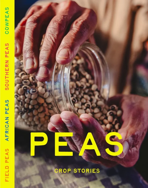 Hands holding jar of assorted Southern peas on the cover of Crop Stories Peas issue